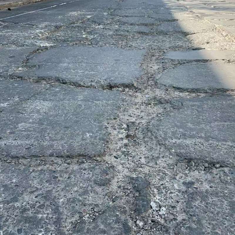 吴旗路面起砂露石子修补料